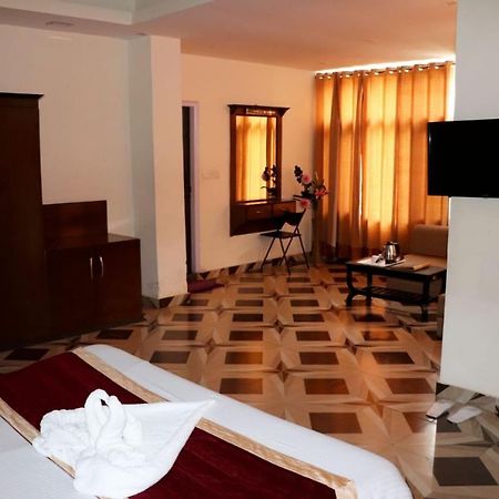 Adb Rooms Snow Touch Resort Manāli Kültér fotó